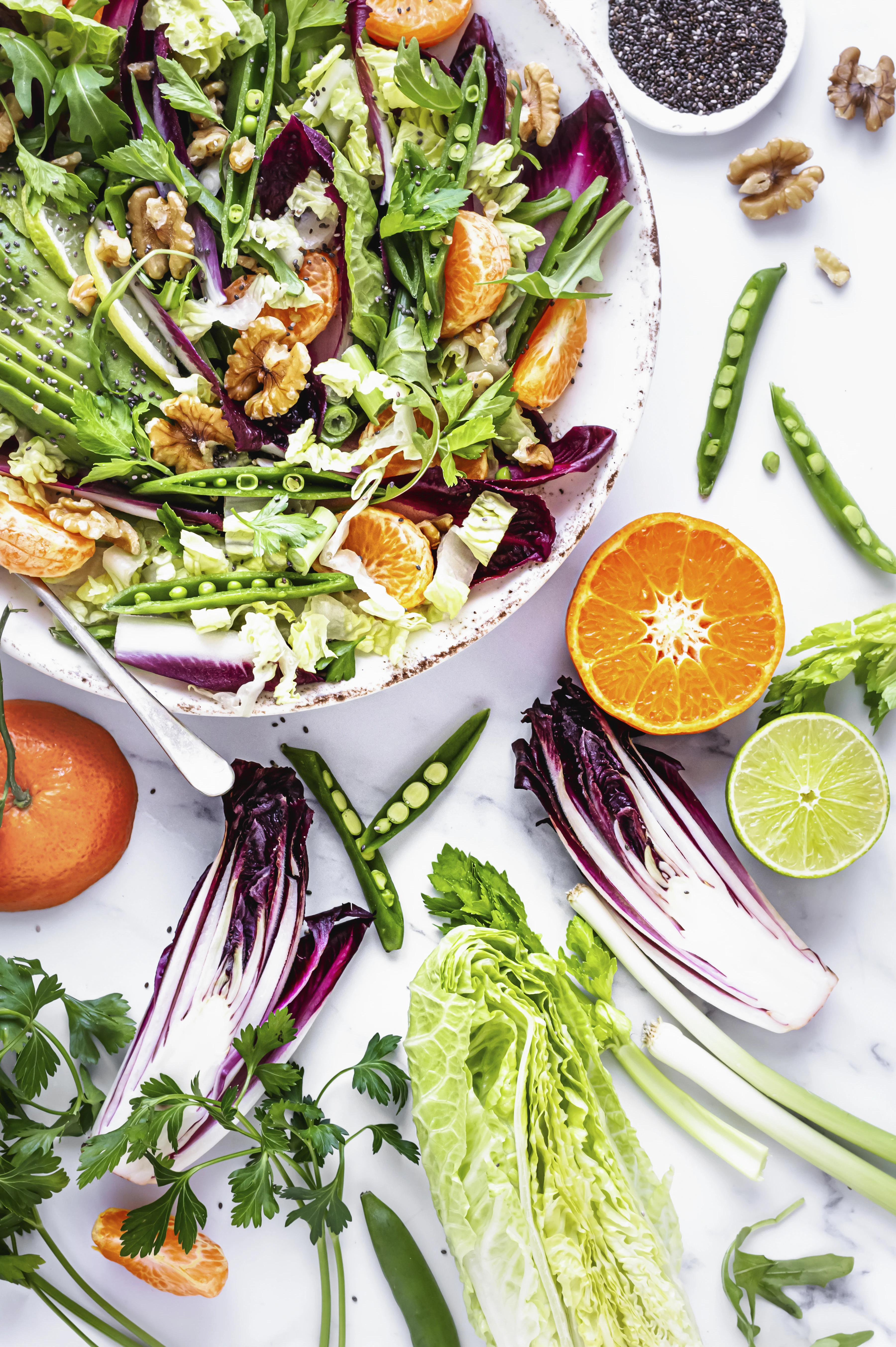 A colourful balanced meal with vegetables, grains and everyday table items